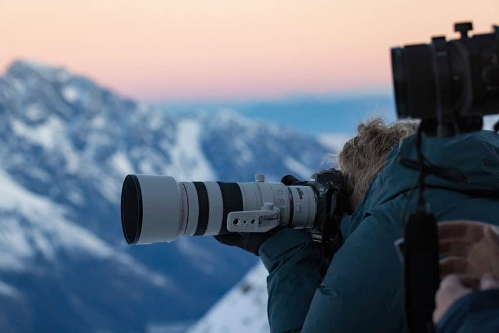 Photographer on balcony at Plateau Hut