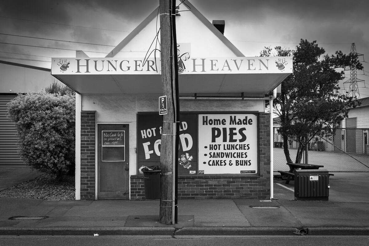 Food shop closed up in an industrial area during Christmas holiday period.