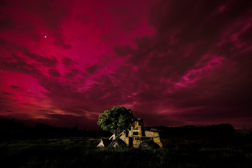 Aurora Australis behind old bulldozer in paddock Canterbury Nov 2025