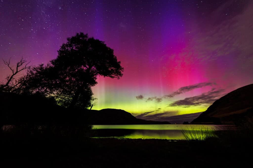 Aurora Australis over Lake Forsyth taken by Tony Stewart, photographer from Christchurch