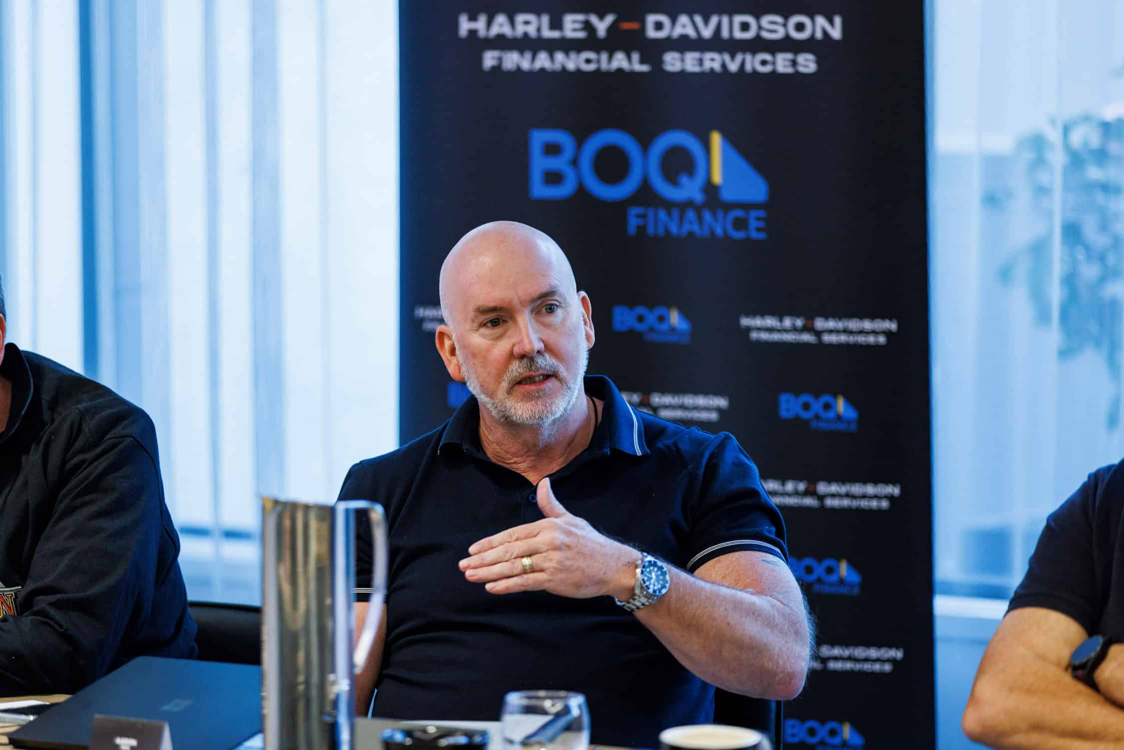 Delegate in discussion at team building event.